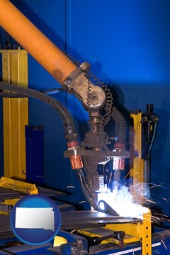 an industrial welding robot - with South Dakota icon